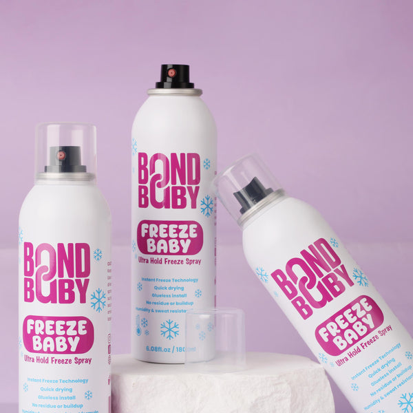 Three bottles of Bond Bubby Freeze Baby spray on a light purple background